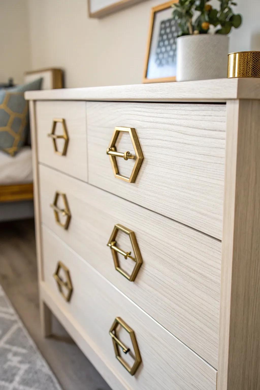 Transform your dresser with bold geometric metal handles for a touch of modern elegance.