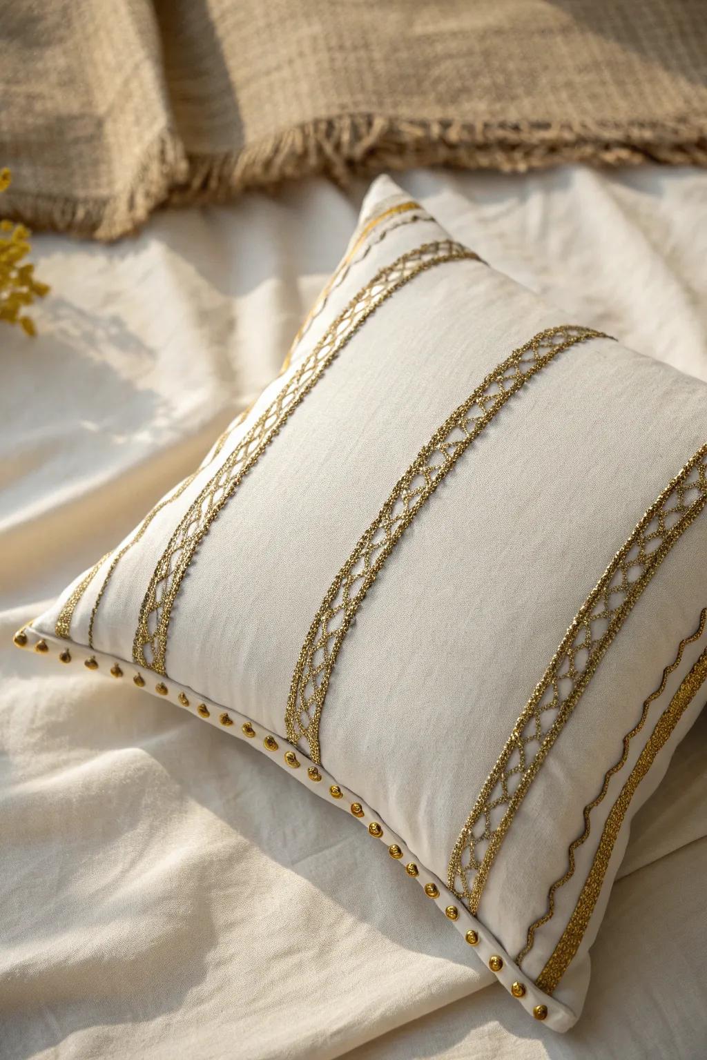 Elevate your decor with minimalist pillows featuring luxurious metallic accents.