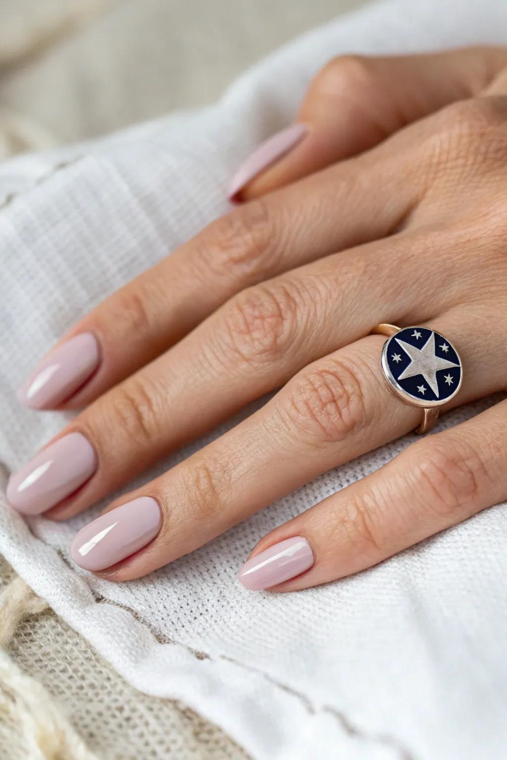 Embrace minimalist elegance with a subtle star accent nail for your Fourth of July look.