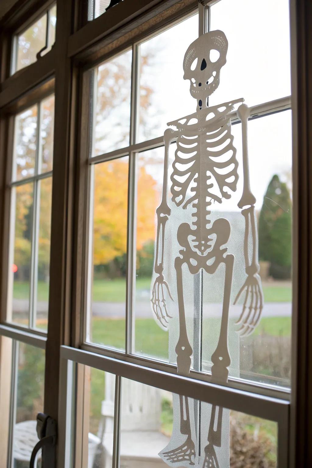 Add a touch of Halloween charm with these minimalist skeleton window clings!