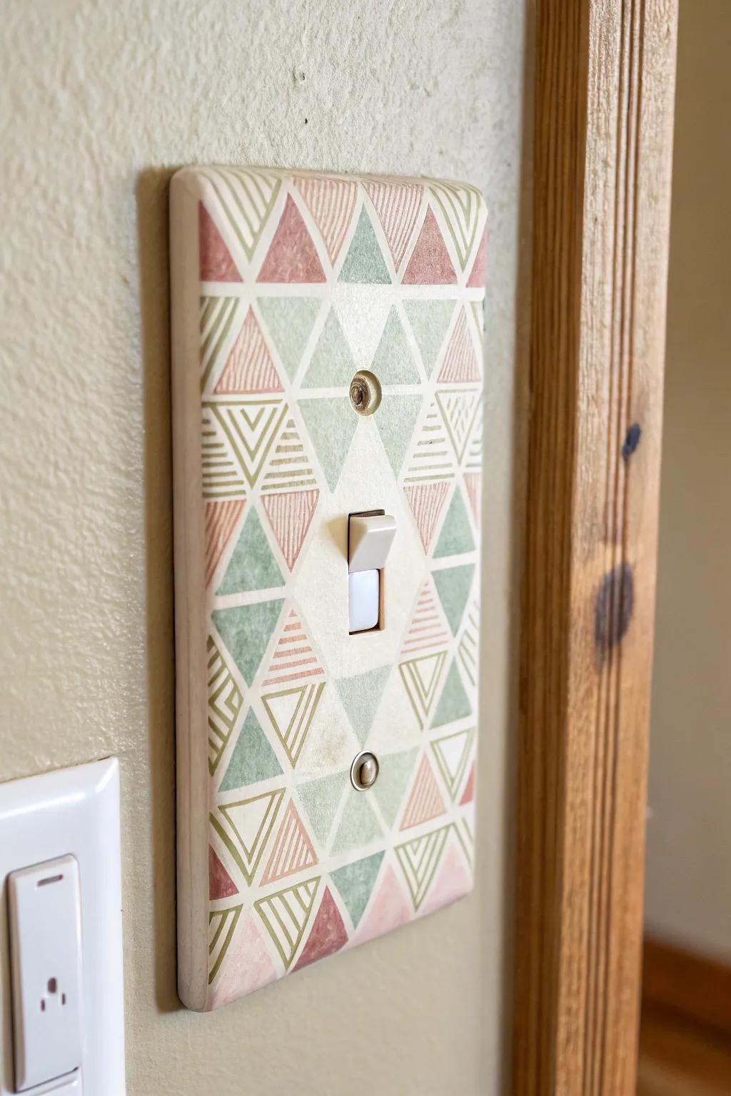 Transform your space with hand-painted geometric light switch covers for a minimalist yet artistic touch.
