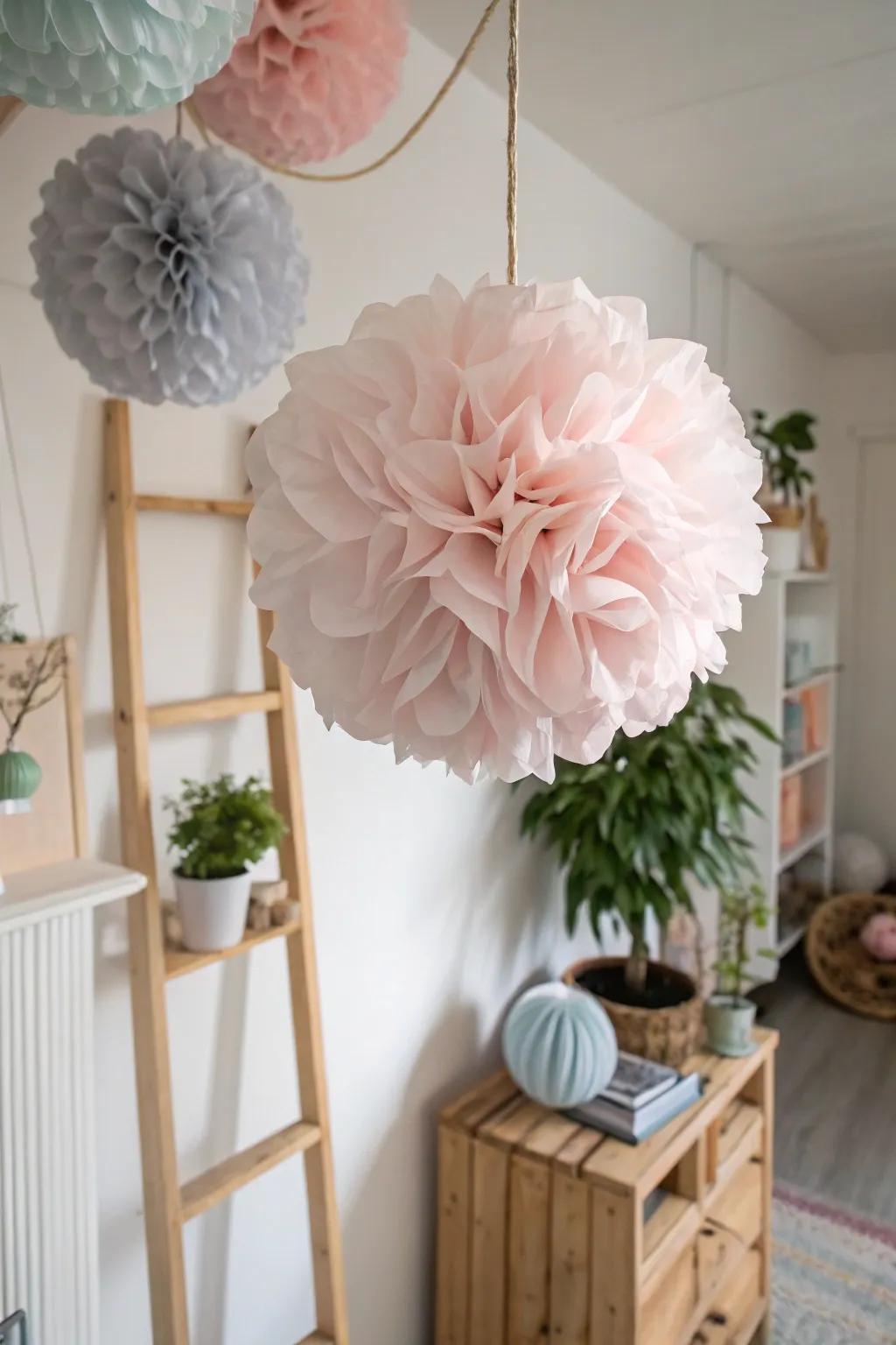 Add a touch of whimsy with handcrafted tissue paper pom poms for a minimalist-boho vibe.