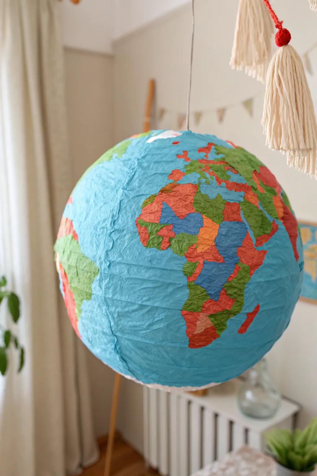 Explore the world with handmade elegance: a paper mache globe that inspires learning and creativity.