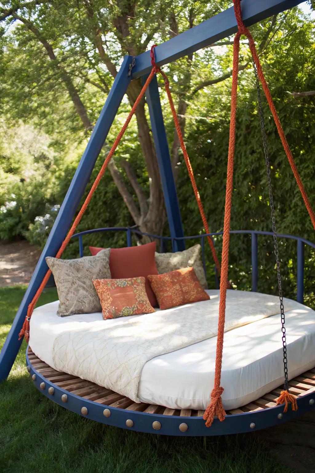 Transform your trampoline frame into a striking hanging daybed for the ultimate relaxation spot.