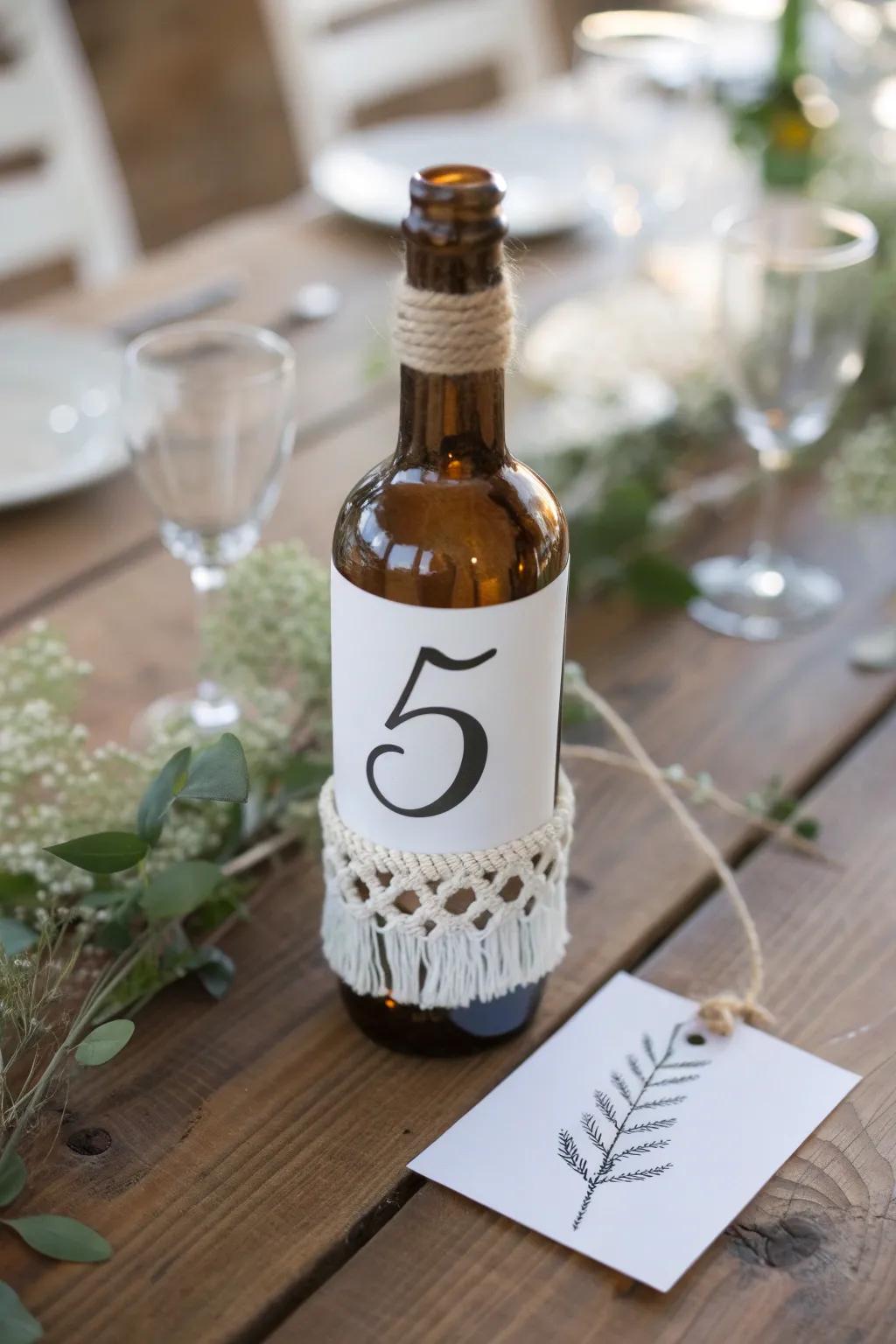 Elevate your table decor with these chic mini bottle number holders, perfect for a minimalist wedding or dinner party.